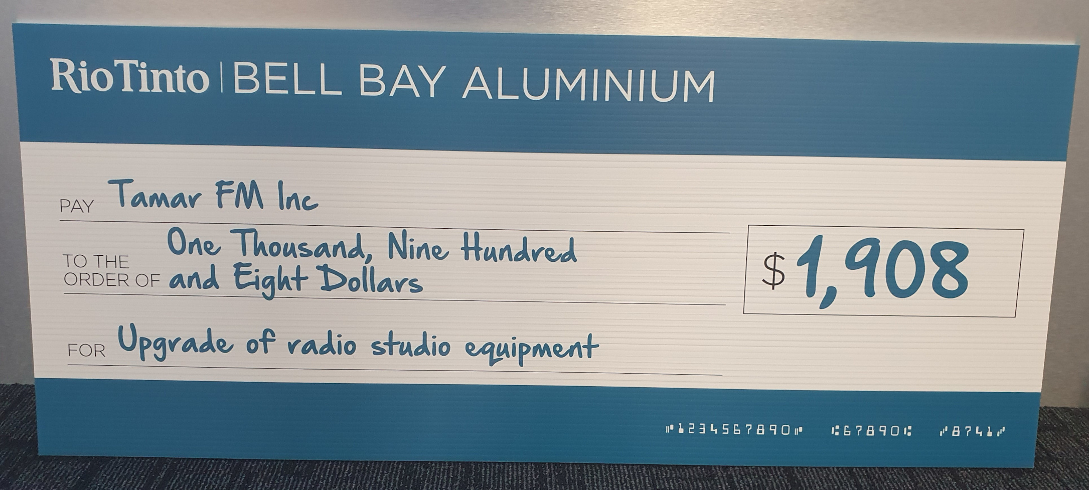 Image of large cardboard cheque from Bell Bay Aluminium